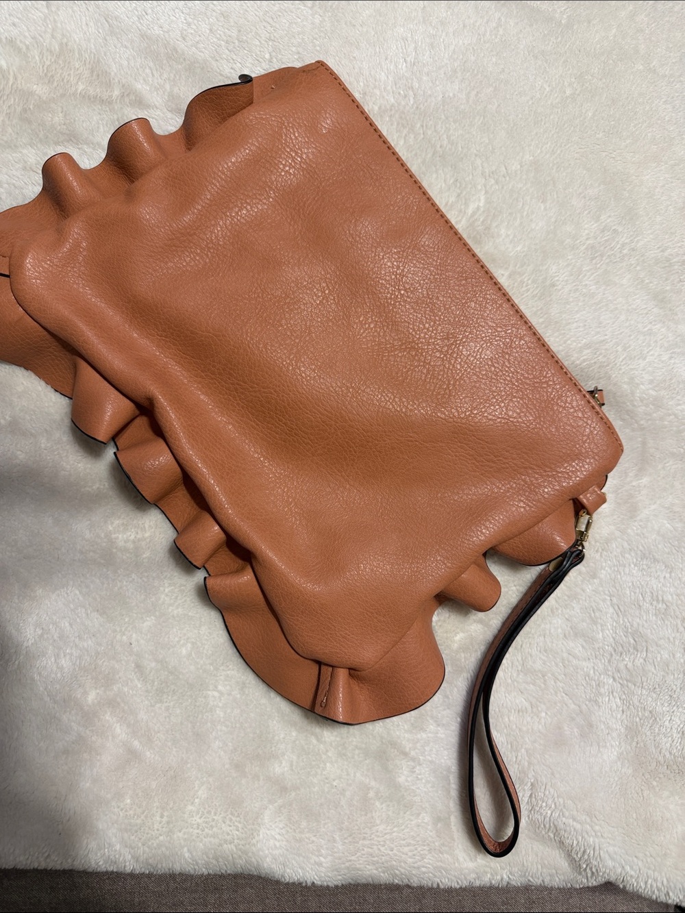Sole society clutch